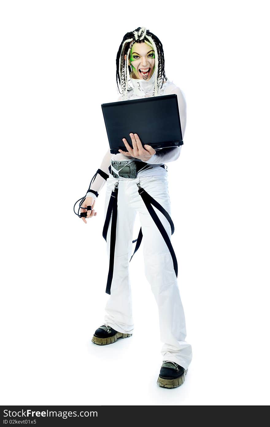 Shot of a futuristic young man with wires holding a laptop. Isolated over white background. Shot of a futuristic young man with wires holding a laptop. Isolated over white background.