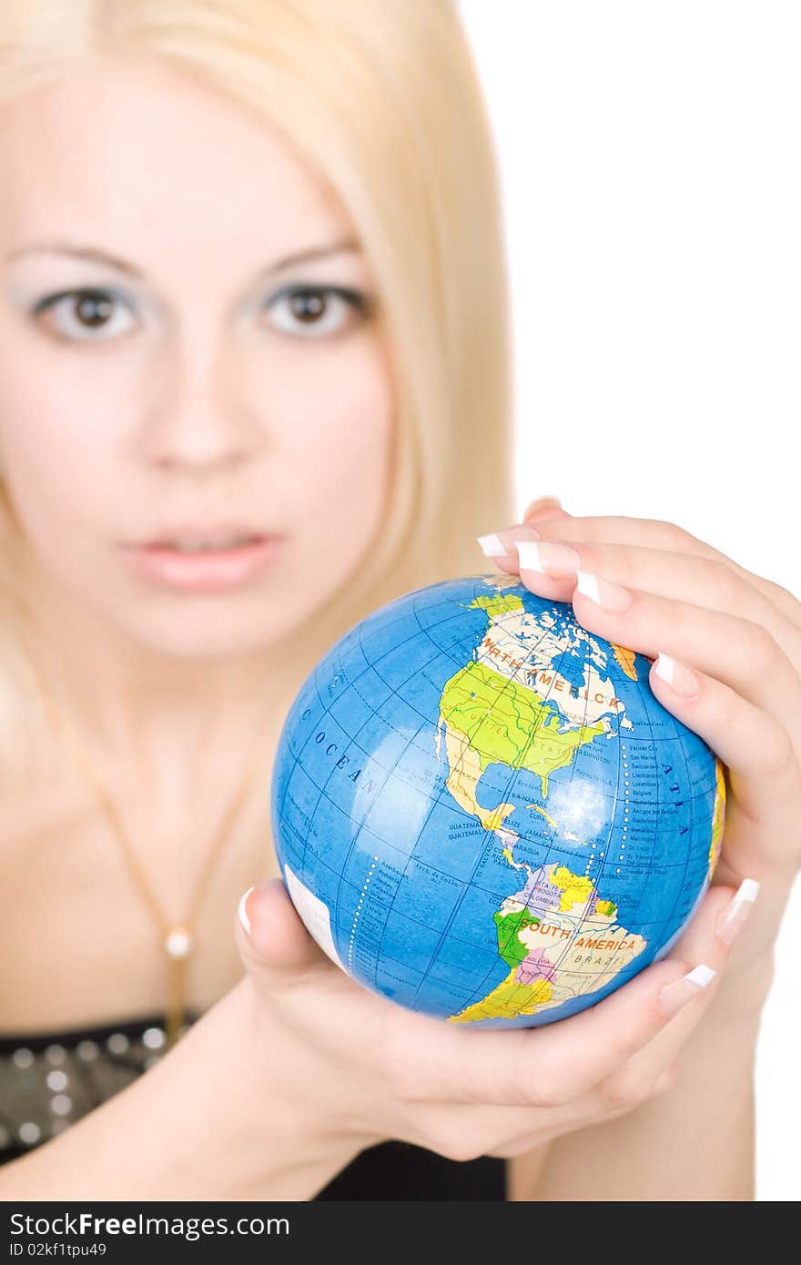 Young blond women holding a globe and with petition looks into the camera. Young blond women holding a globe and with petition looks into the camera