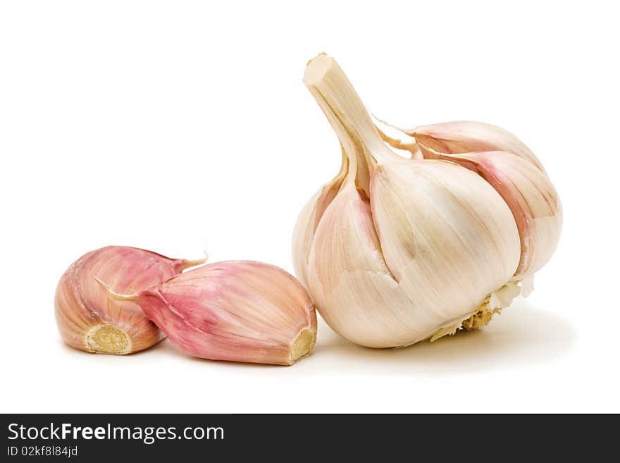 Seasonal fresh garlic on white background