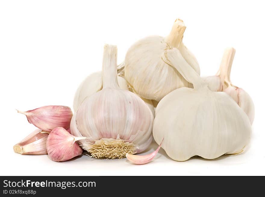 Seasonal fresh garlic on white background