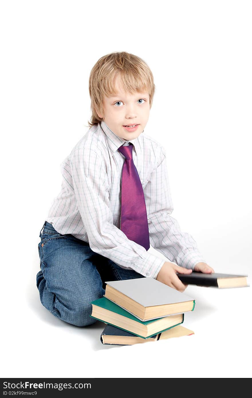 Young boy with books