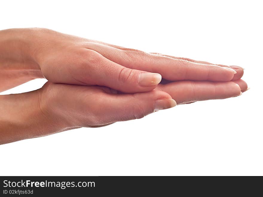 Beautiful woman's hands closed. Isolated on white background