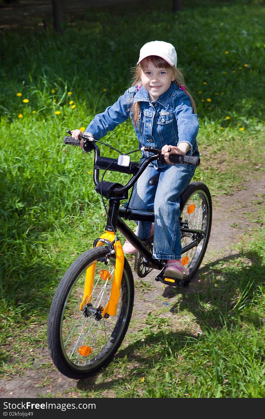 The girl on a bicycle