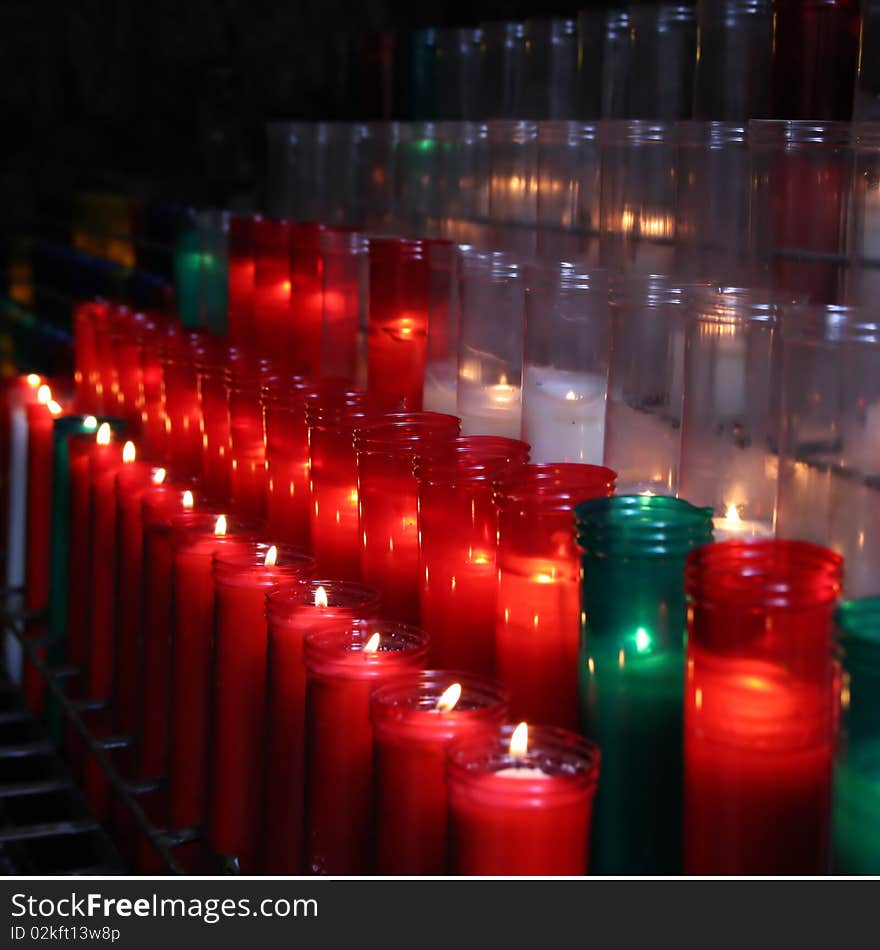 Candles about a Catholic temple. Candles about a Catholic temple.