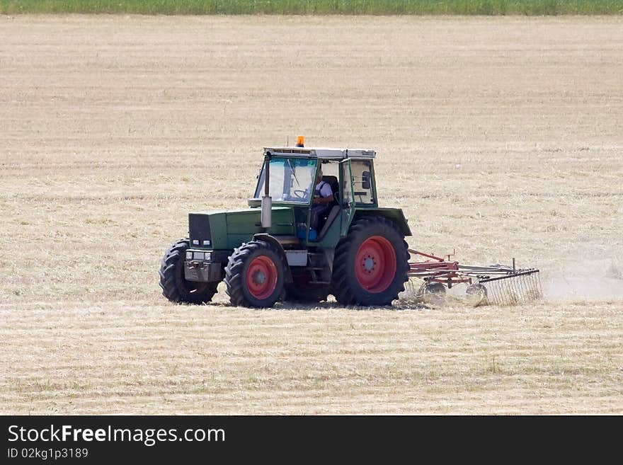 Tractor In A Wheat Field