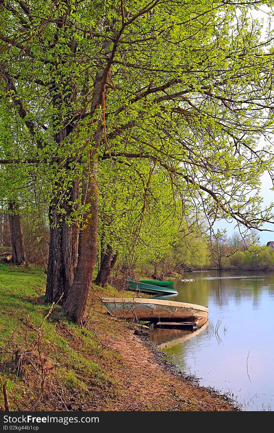 Wooden boat on coast river. Wooden boat on coast river