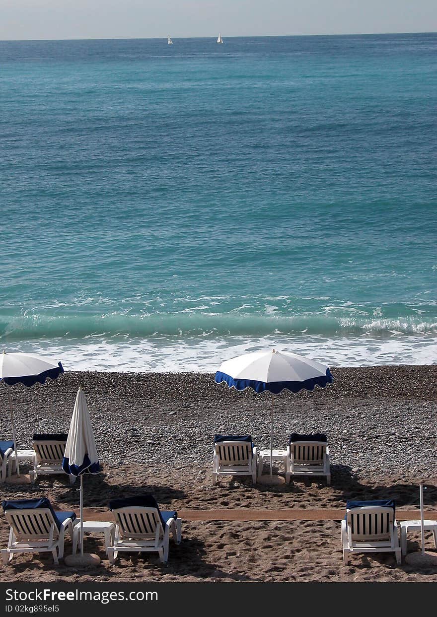 Sun Loungers On The Beach At Nice