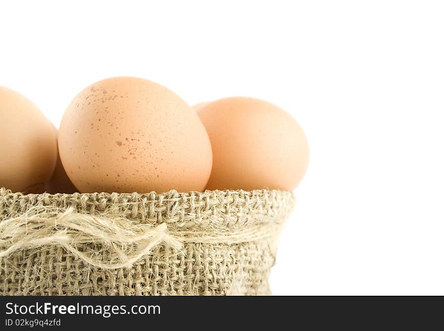 Many eggs are in the bag. Isolated on white background