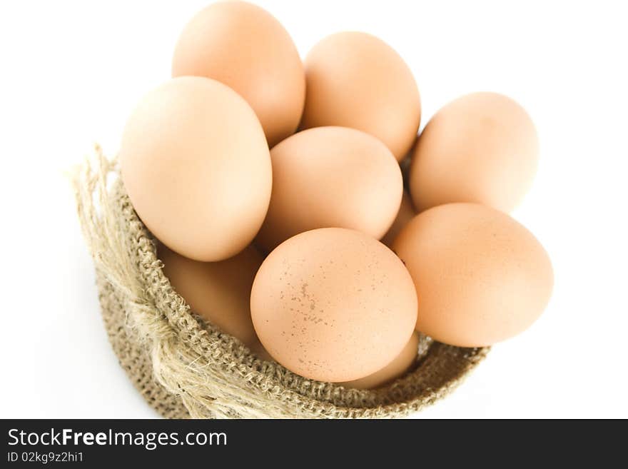 Many eggs are in the bag. Isolated on white background