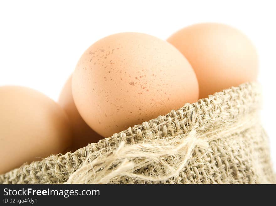 Many eggs are in the bag. Isolated on white background