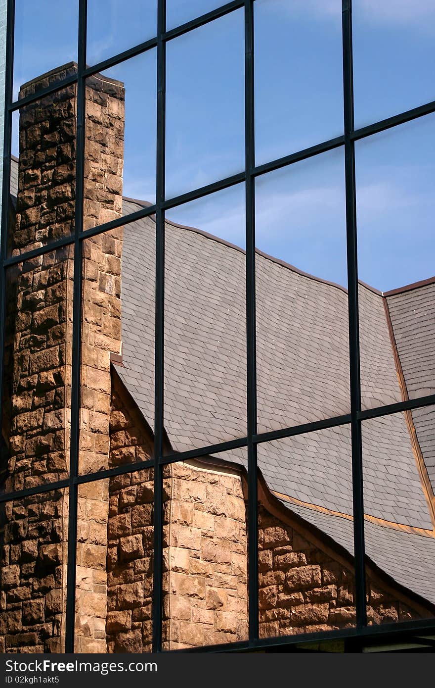 Church reflection in a glass window