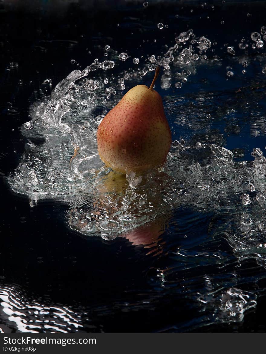 Pear with water splash