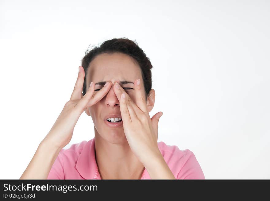 Woman in pain, pinching top of nose with her fingers. Woman in pain, pinching top of nose with her fingers