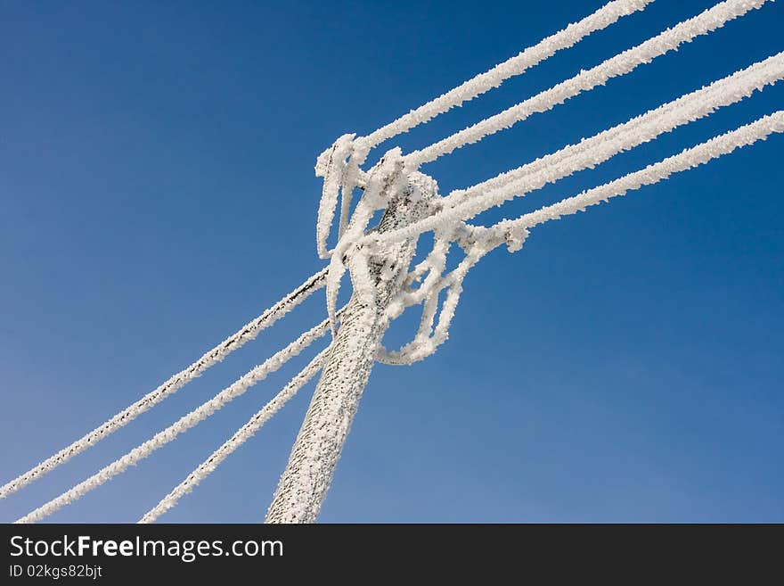 Hoar frost on the telephonic line in cold day