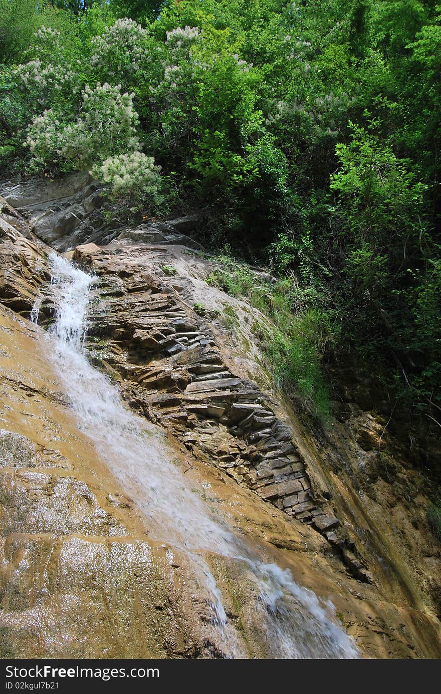 Beautifull waterfall, rock and bush