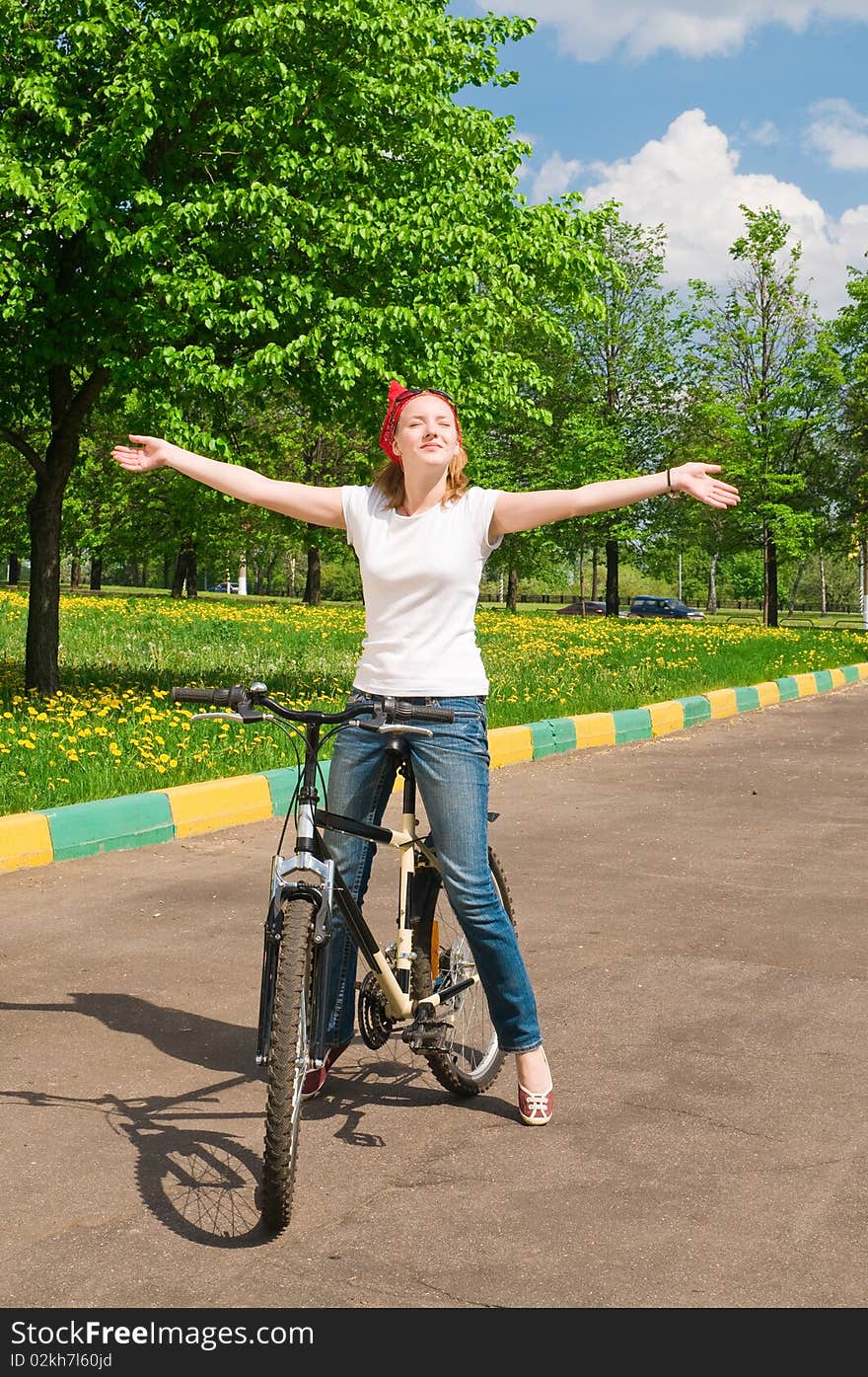 Shoot of young woman with bicycle