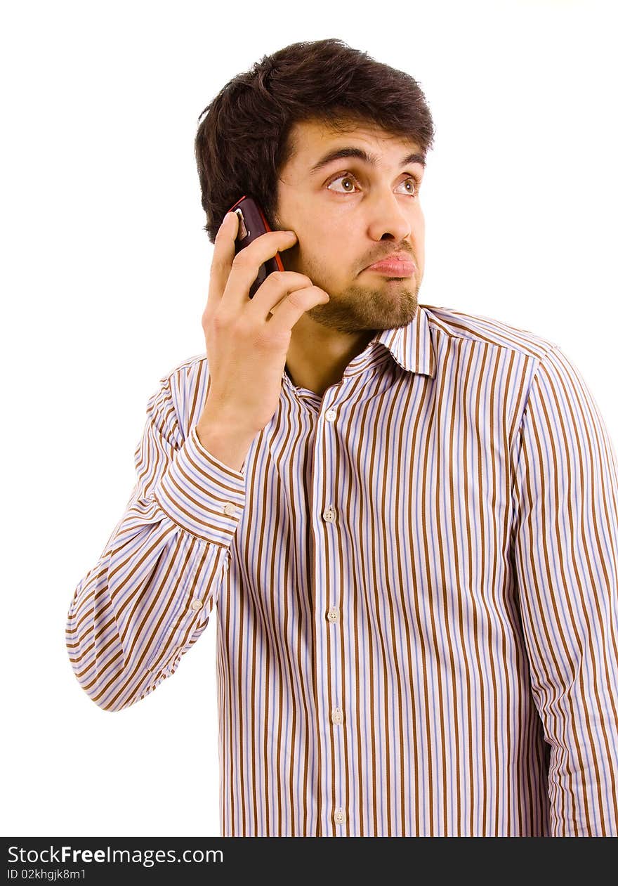 Portrait of young man on the phone, isolated on white