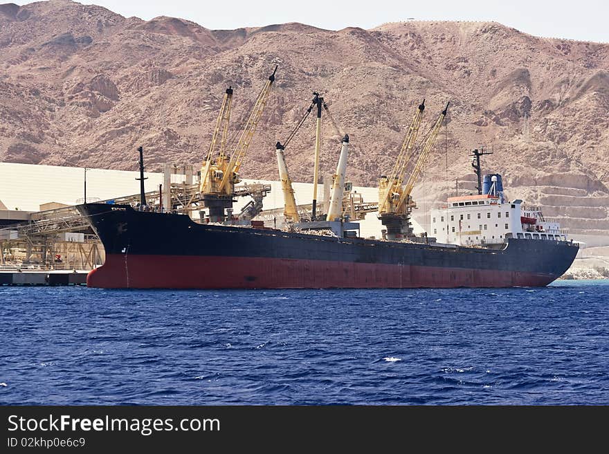 Cargo ship docked in Aqaba port. Jordan