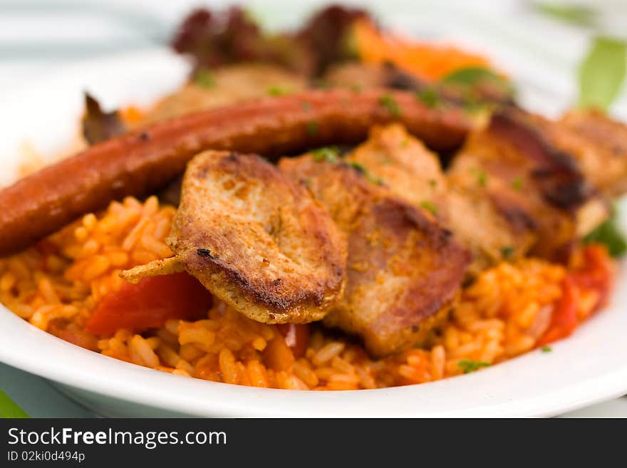 Big skewer,mixed meat,pork and lamb,with vegetable salad .