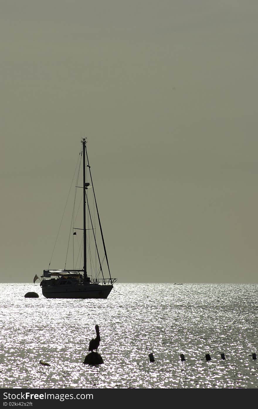 Sail boat in the ocean at Sunset in the Caribbean. Sail boat in the ocean at Sunset in the Caribbean