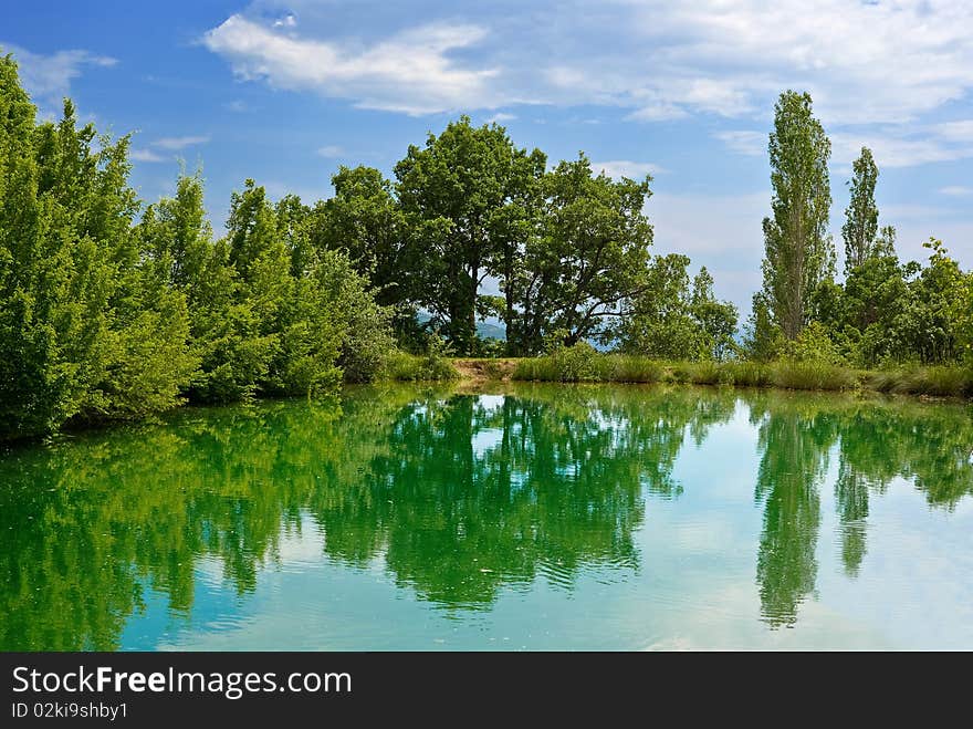 Emerald lake by a summer day