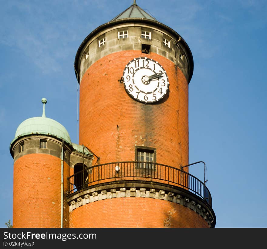 The bricks tower with clocktower