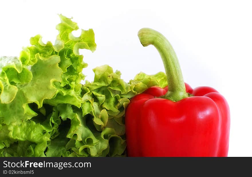 Red pepper with salad, isolated on white. Red pepper with salad, isolated on white