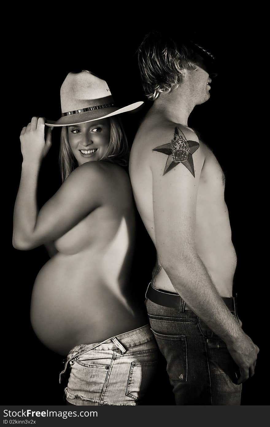 Pregnant Couple in Western Wear