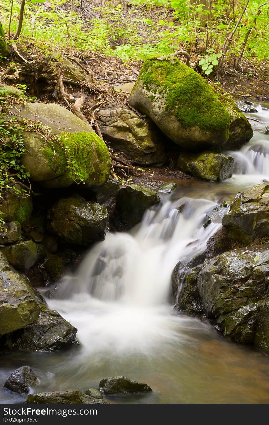 Wonderful mountain stream and waterfall. Wonderful mountain stream and waterfall.