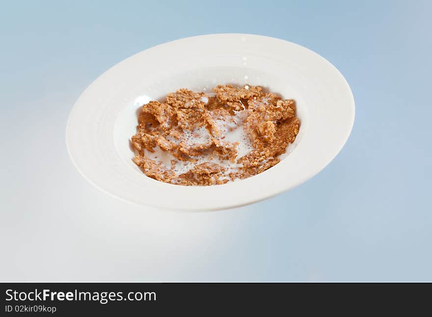 Cornflakes, isolate on blue background