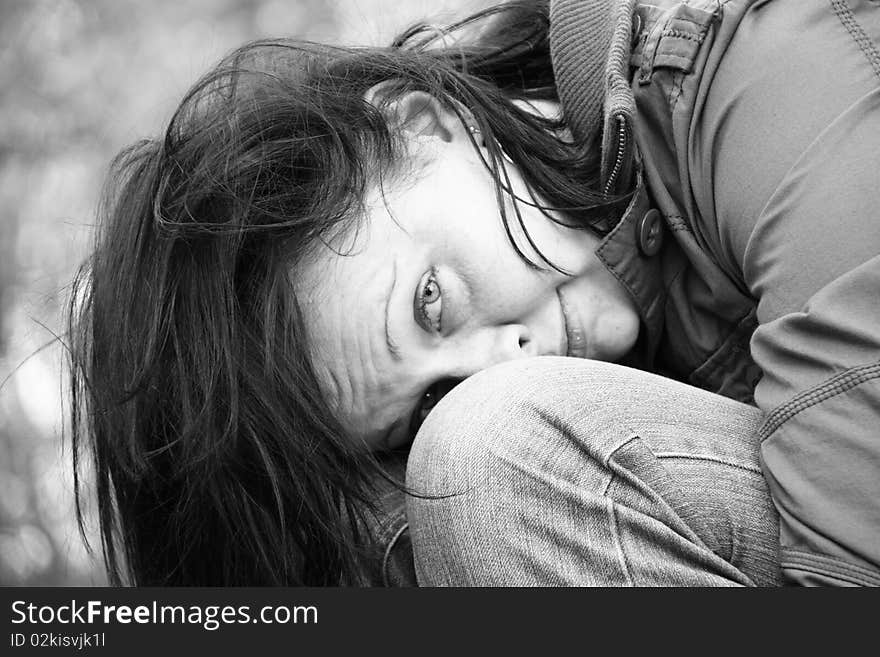 Close up portrait of a young woman in black and white.