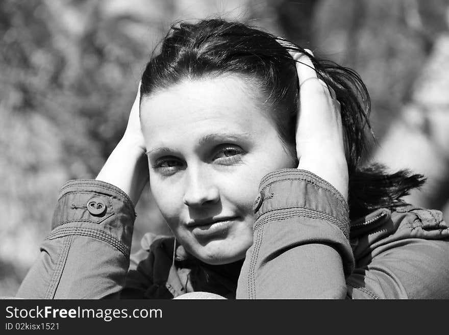 Close up portrait of a young woman in black and white.