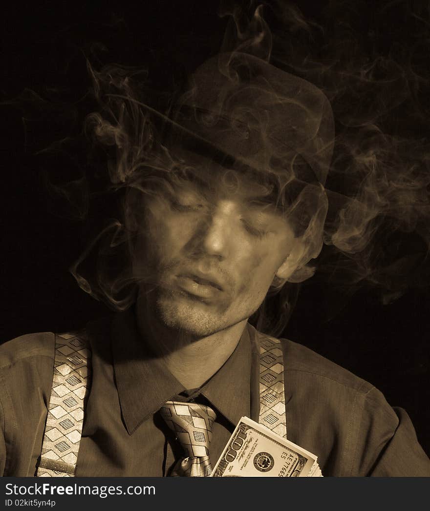 Old style photo of man counting money and smoking cigar