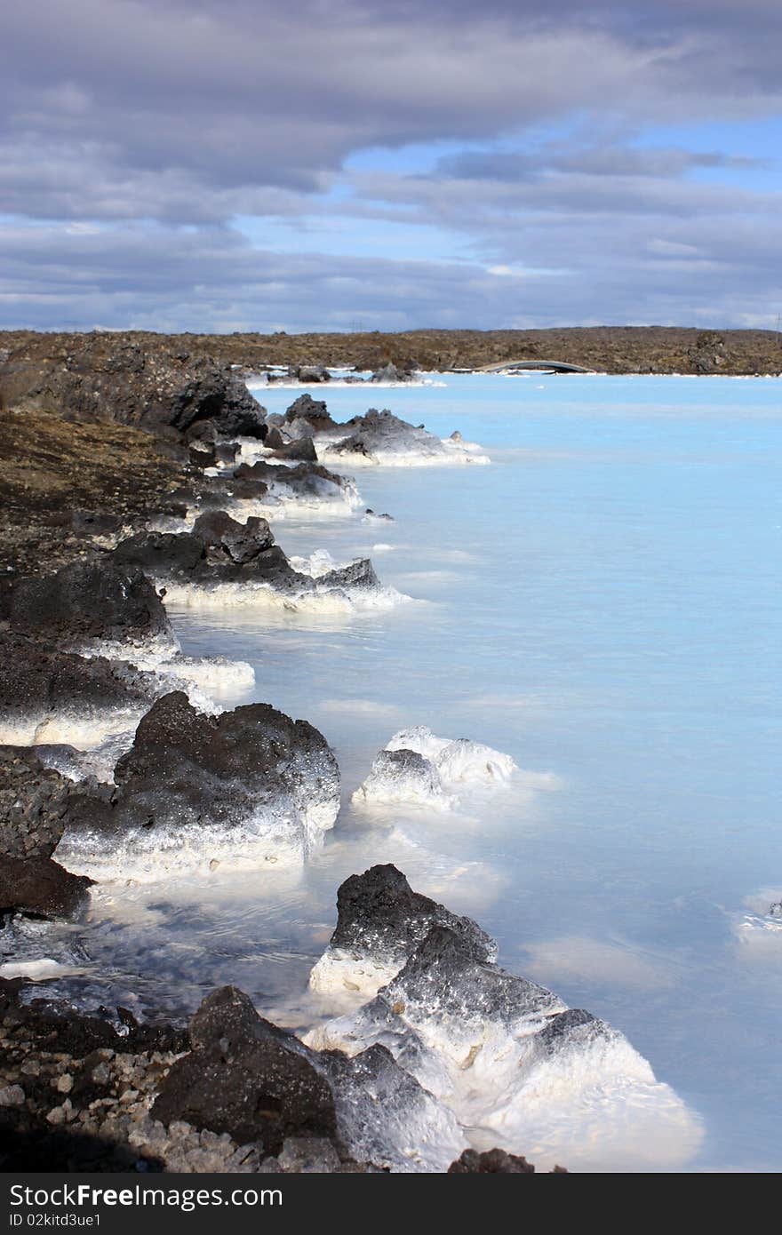 The bright blue waters of the blue lagoon in iceland famous for its thermal spa