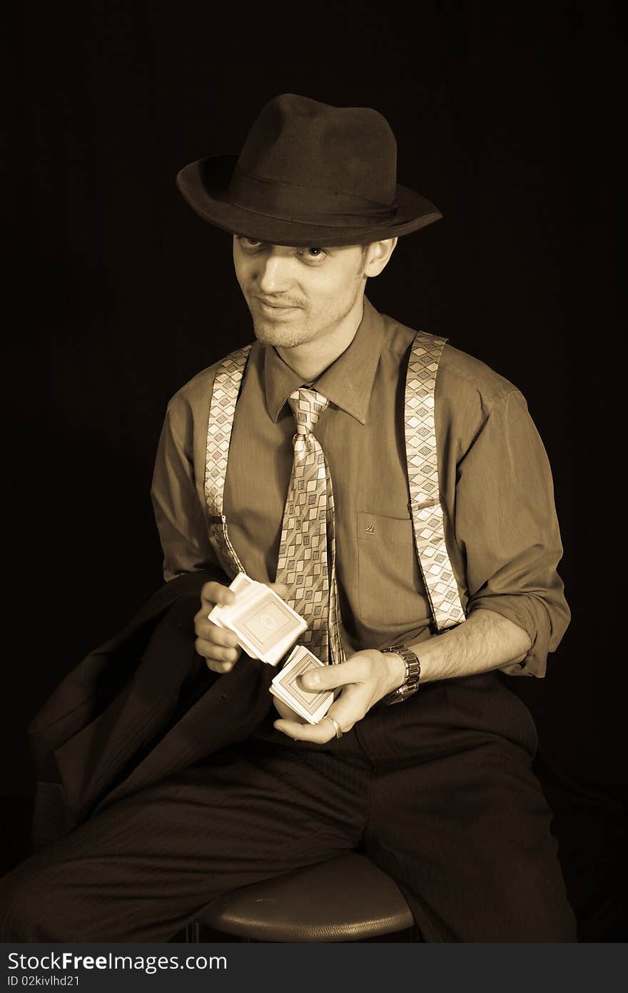 Old style photo of man playing card game. Old style photo of man playing card game