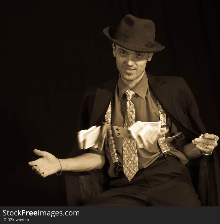 Old style photo of man playing card game. Old style photo of man playing card game