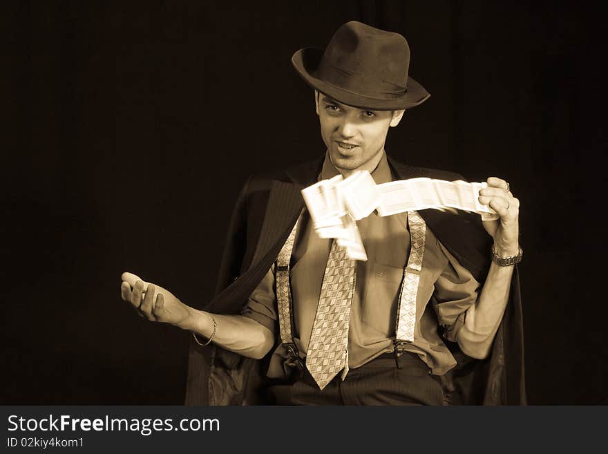 Old style photo of man playing card game. Old style photo of man playing card game