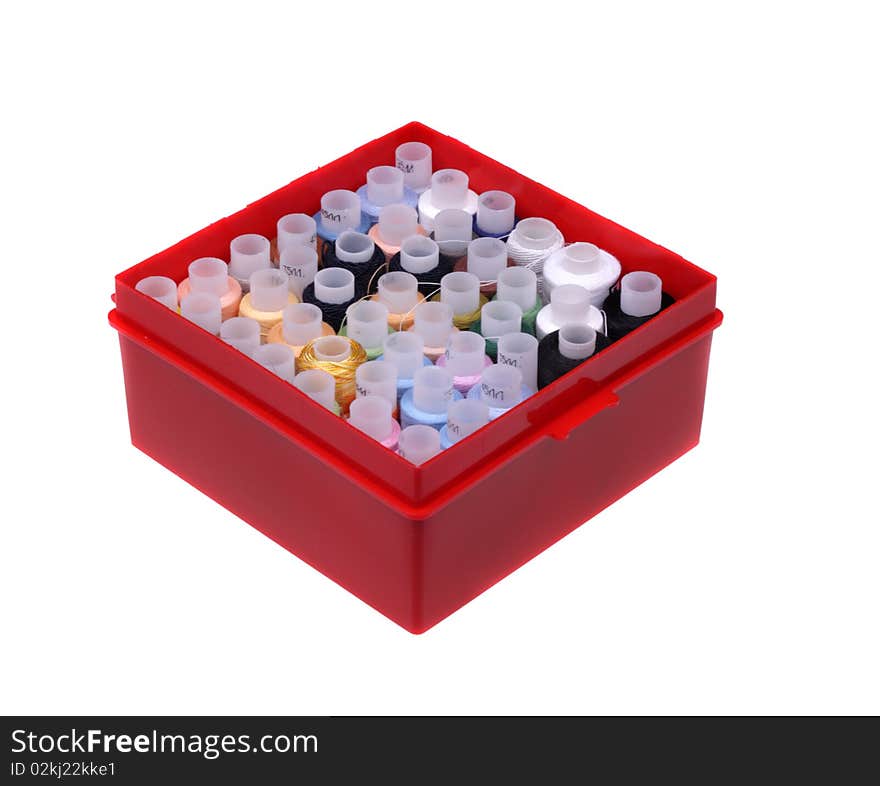 Colored threads in red box. Isolated object on a white background