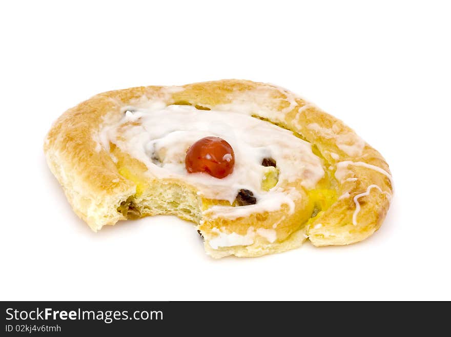 Danish pastry with a bite taken