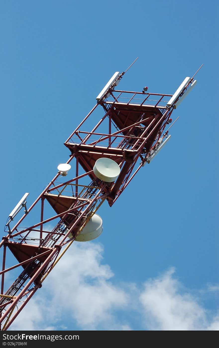 Telecommunication tower on blue sky