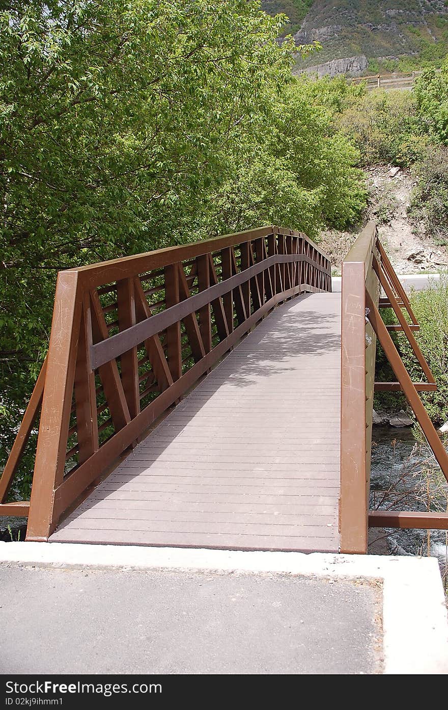 Long brown bridge in the mountains. Long brown bridge in the mountains