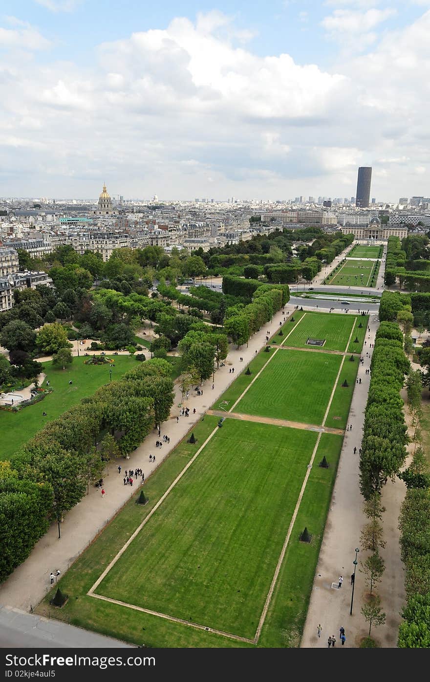 The Champ de Mars is a large public greenspace in Paris, France. View from Eiffel Tower.