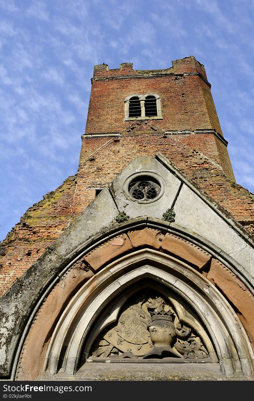 Building details of old church located in Stanmore London, blue sky in background. Building details of old church located in Stanmore London, blue sky in background