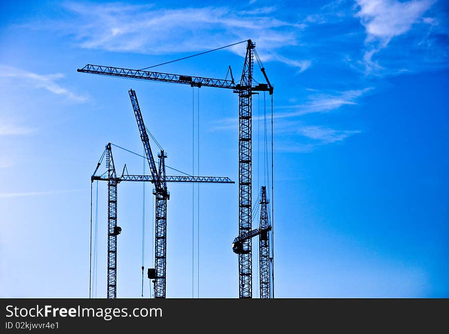 The crane elevating against the sky