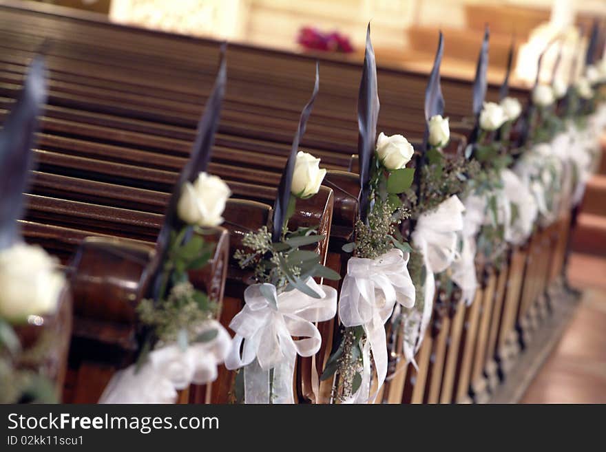 Cherch decorated aisle with white rose. Cherch decorated aisle with white rose