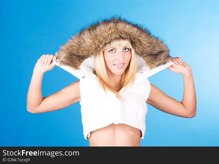 Portrait of winter girl wearing white vest