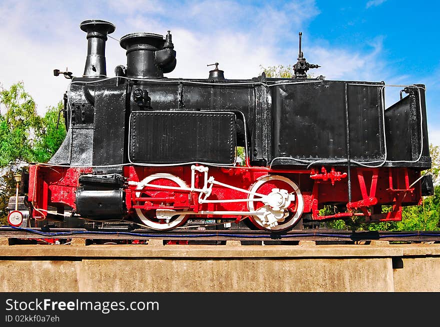 Black old steam locomotive reconditioned. Black old steam locomotive reconditioned