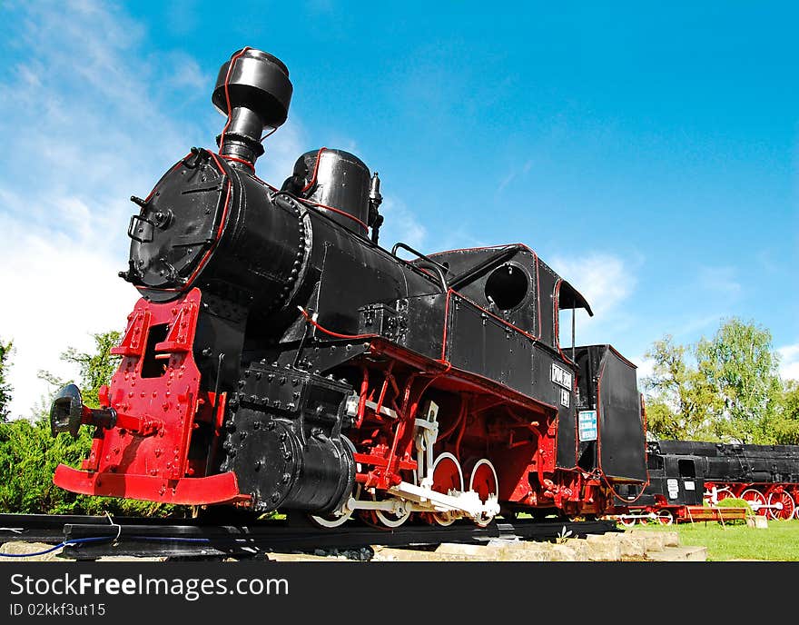 Black old steam locomotive reconditioned. Black old steam locomotive reconditioned