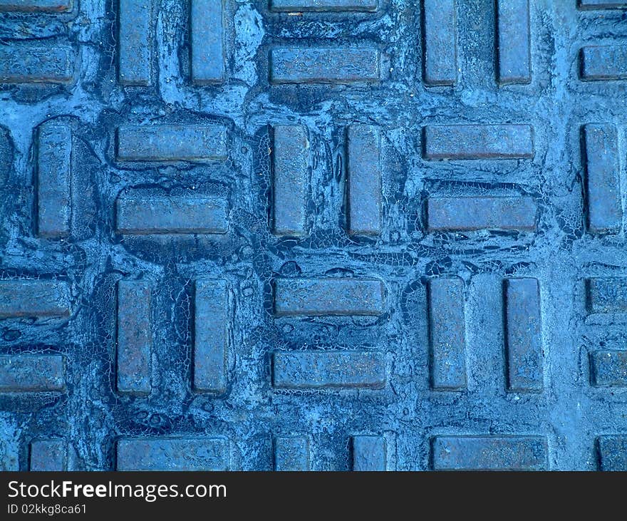 Blue brick mosaic on sidewalk from dowtown Winnipeg, Manitoba, Canada