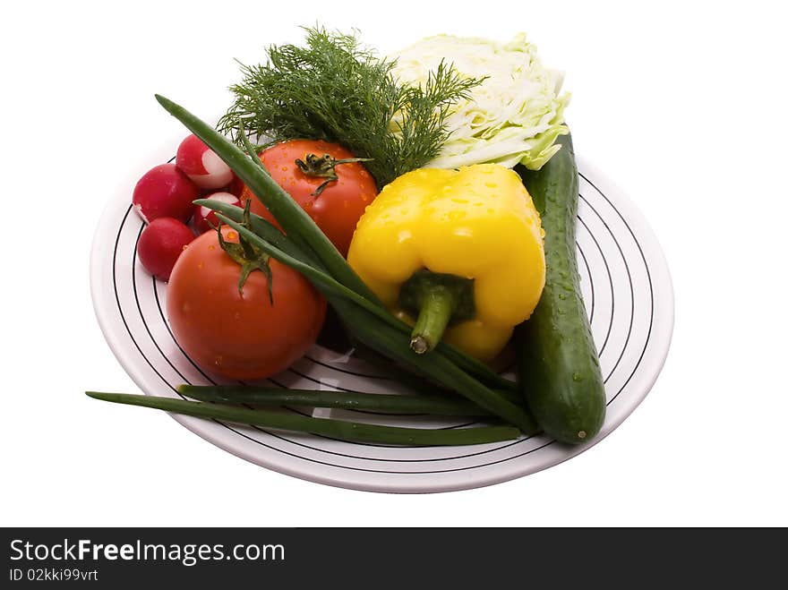 Ingredient for salad.
White plate is on the white backround.